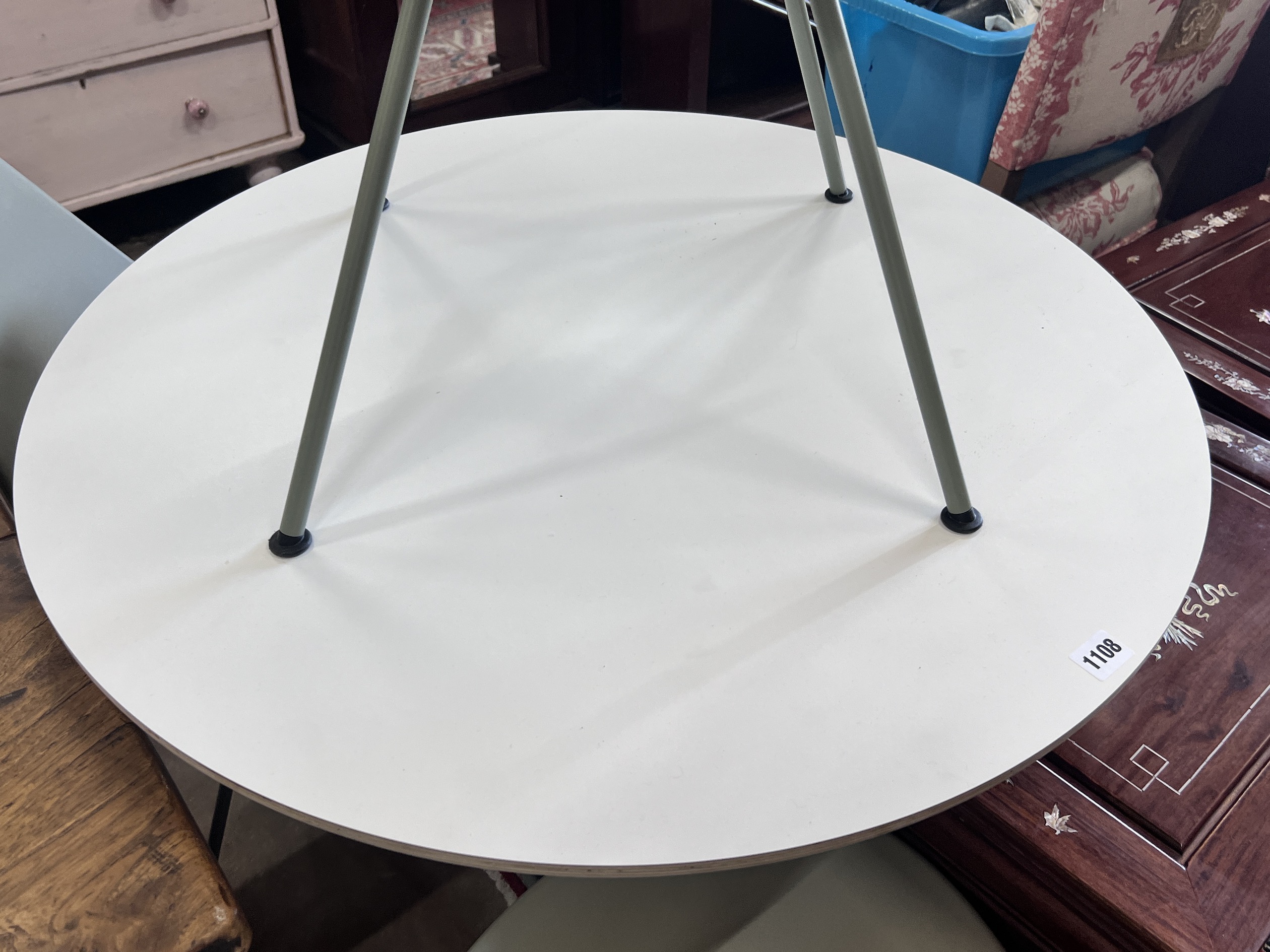 Arne Jacobsen for Fritz Hansen, three 'drop' chairs and a Hay Productions circular table, diameter 80cm, height 74cm